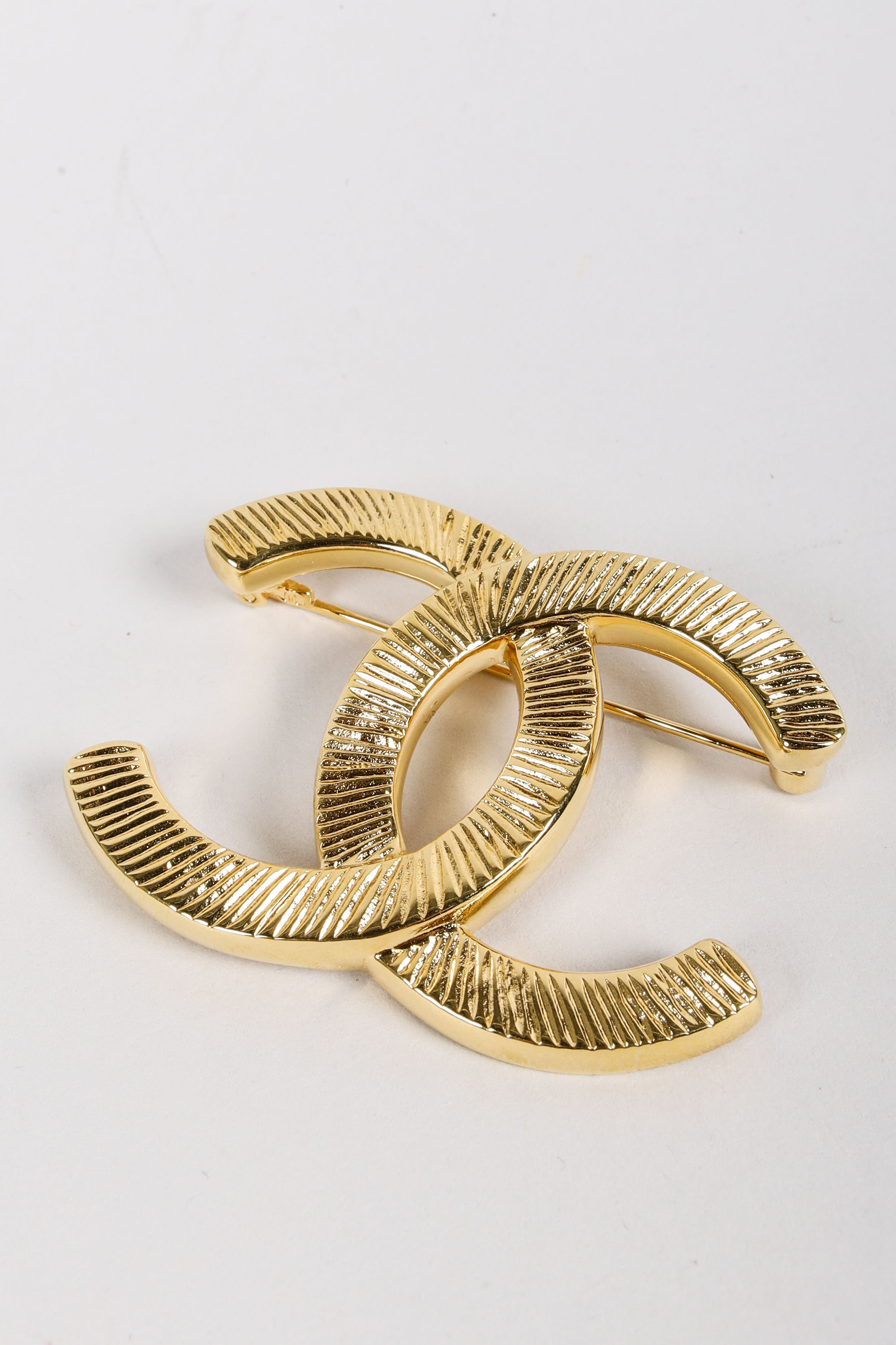 Chanel 22A CC Gold Brooch — BLOGGER ARMOIRE